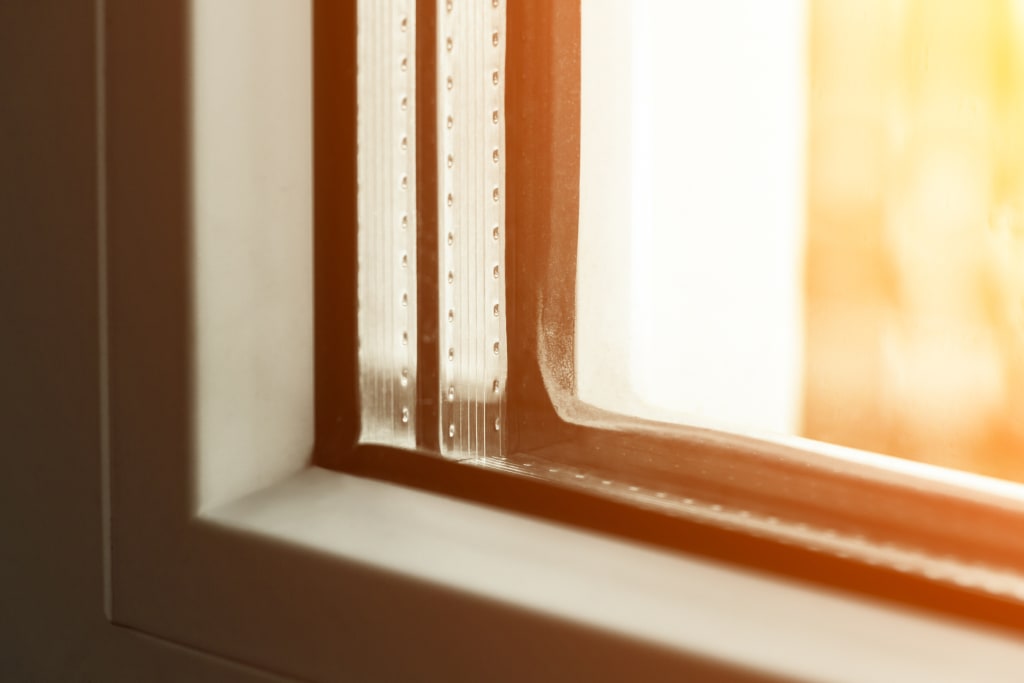 Kozijn met triple glas daarin