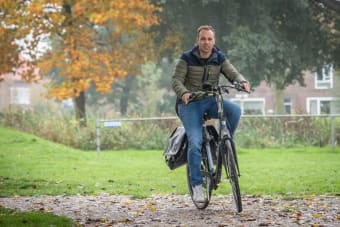 Foto van Martijn op zijn fiets.