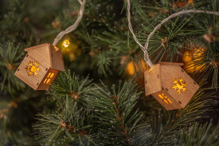 Kerstboom met huisjes verlichting